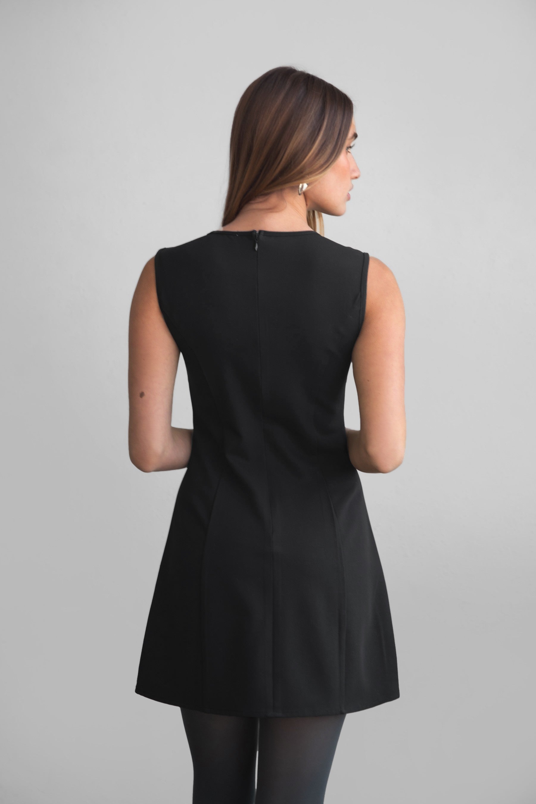 TIC TOC DA31131 BRILYN Black Wool Dobby Mini Dress with scoop neck, bow bust details, and A-line skirt.