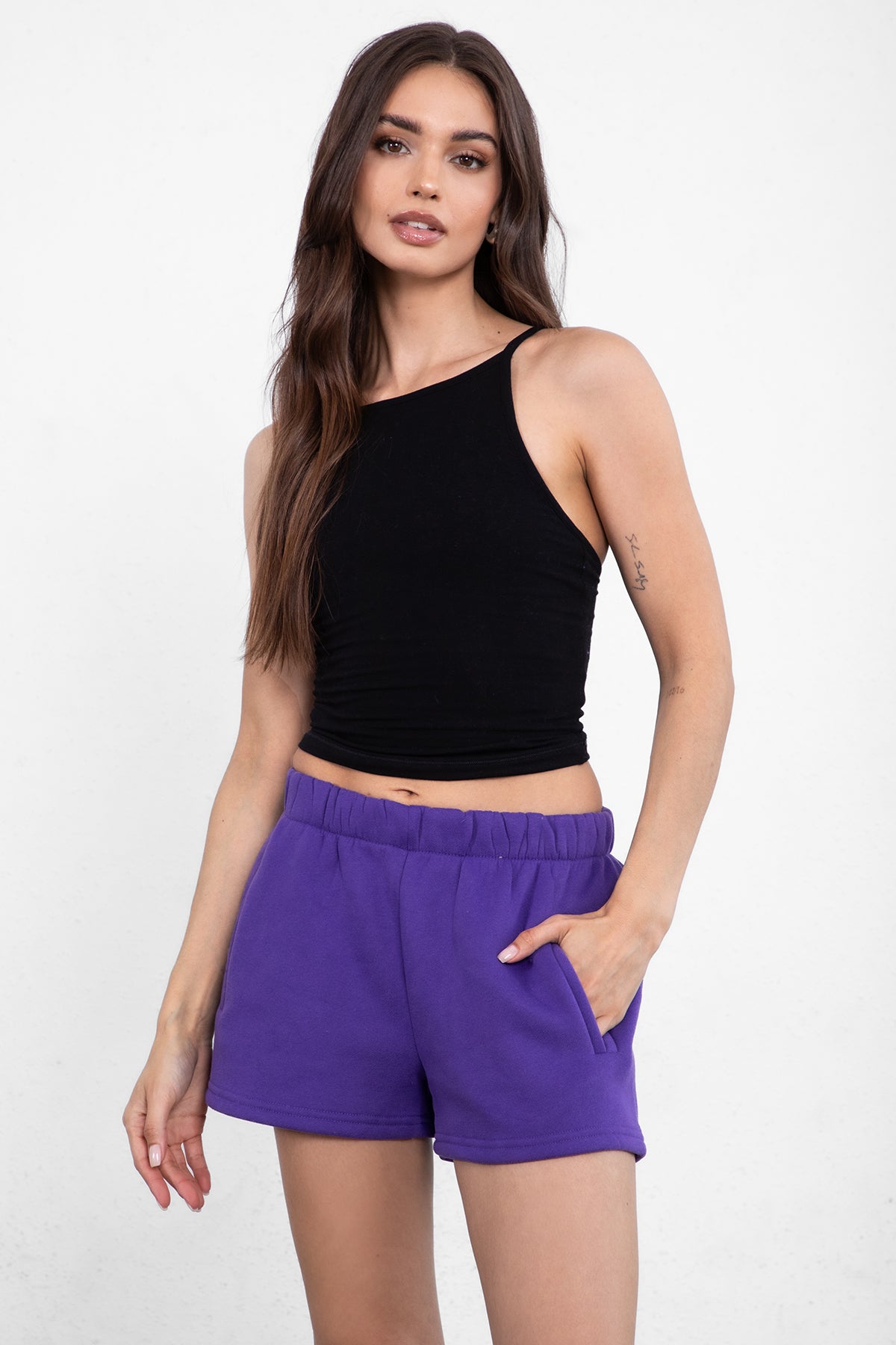 Purple fleece sweat shorts with a smooth texture and relaxed fit by Tic Toc.