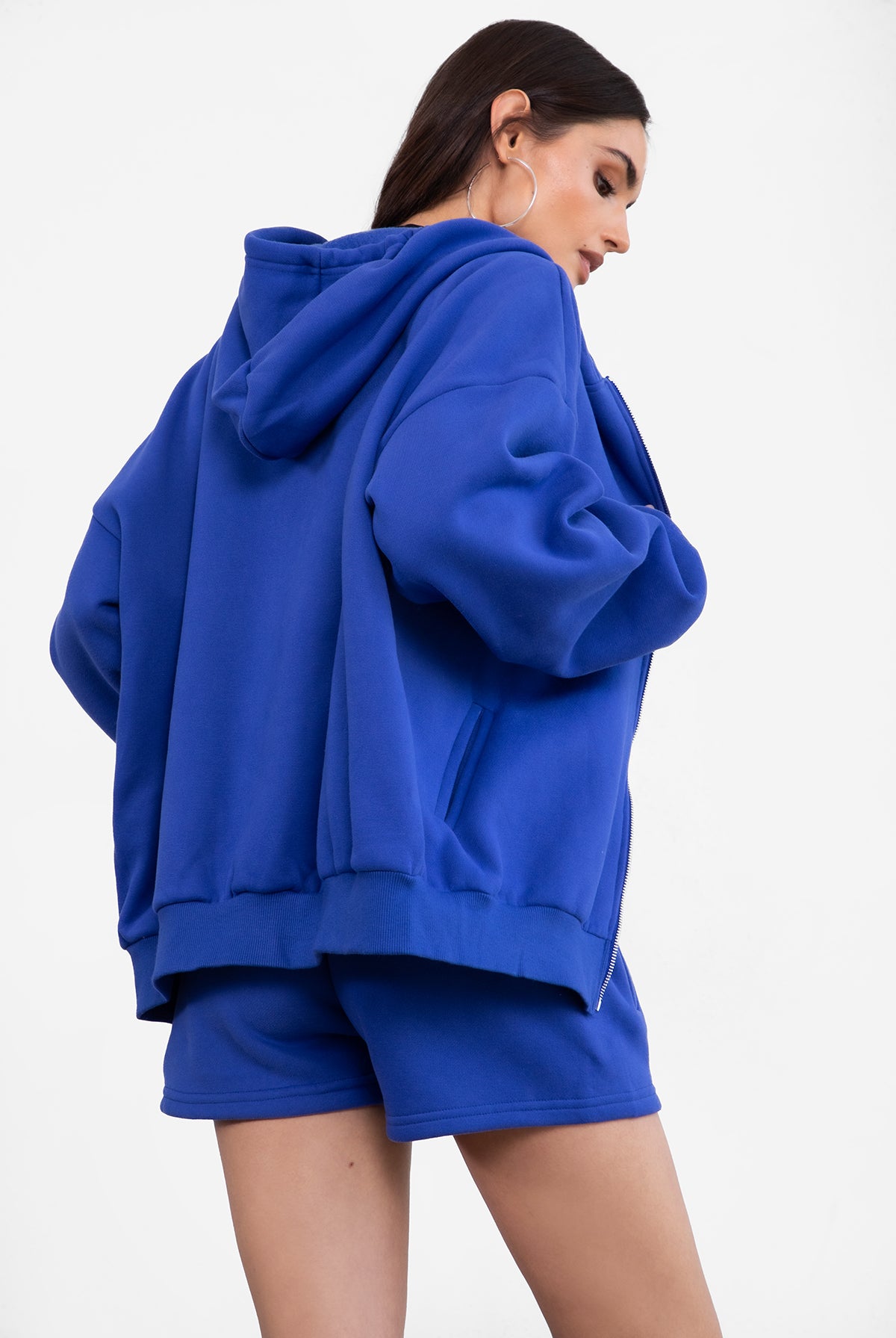 Royal blue fleece shorts with thick fabric and deep side pockets, designed for all-day comfort by Tic Toc.