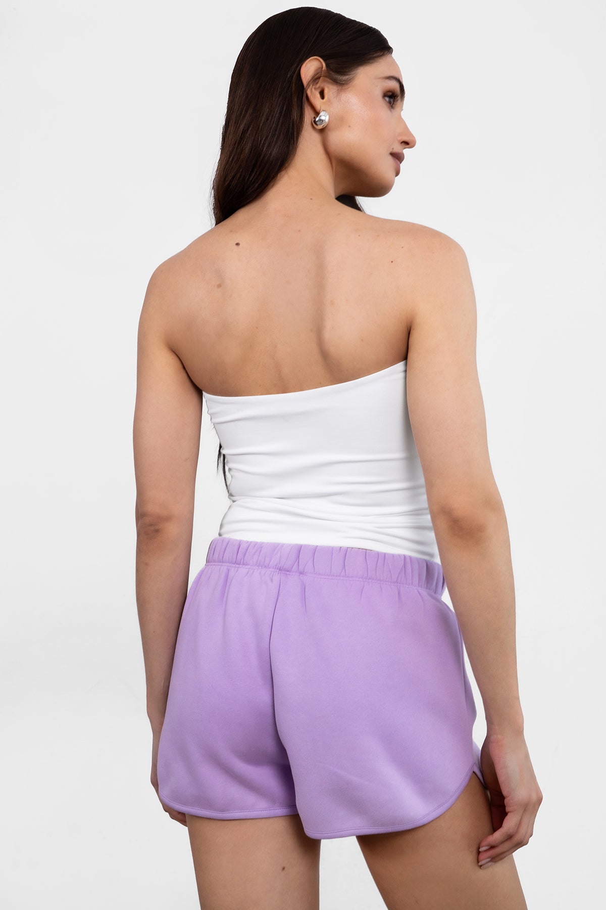 SHORTY  Solid Drawstring Waist Fleece Track Mini Short
 Mid Rise Waistband
Adjustable Waist Drawstring Tie
Retro Sporty Dolphin Curved Hemline
Straight Leg Fit Inseam 2.75 inches
SHORTY  Solid Drawstring Waist Fleece Track Mini Shorts
 Mid-Rise Waistband
Adjustable Waist Drawstring Tie
Retro Sporty Dolphin Curved Hemline
Inseam 2.75 inches
Matching Shades to the Essentials Plush Fleece Collection
Plush Fleece Key Features:
Plush & Fluffy Texture: Ultra-soft and incredibly cozy.
Heavyweight Warmth: Provides