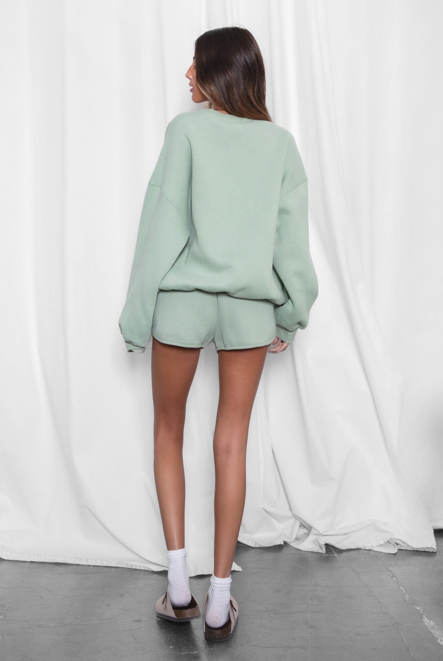 SHORTY Solid Drawstring Waist Fleece Track Mini Short
Mid Rise Waistband
Adjustable Waist Drawstring Tie
Retro Sporty Dolphin Curved Hemline
Straight Leg Fit Inseam 2.75 inches
SHORTY Solid Drawstring Waist Fleece Track Mini Shorts
Mid-Rise Waistband
Adjustable Waist Drawstring Tie
Retro Sporty Dolphin Curved Hemline
Inseam 2.75 inches
Matching Shades to the Essentials Plush Fleece Collection
Plush Fleece Key Features:
Plush & Fluffy Texture: Ultra-soft and incredibly cozy.
Heavyweight Warmth: Provides