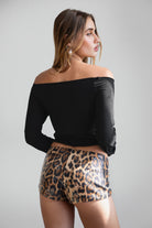 TIC TOC PH30980 CHEETAH Leopard Print Sequin Micro Shorts. Low-rise festival shorts with shimmering leopard print sequins and hidden side zipper.