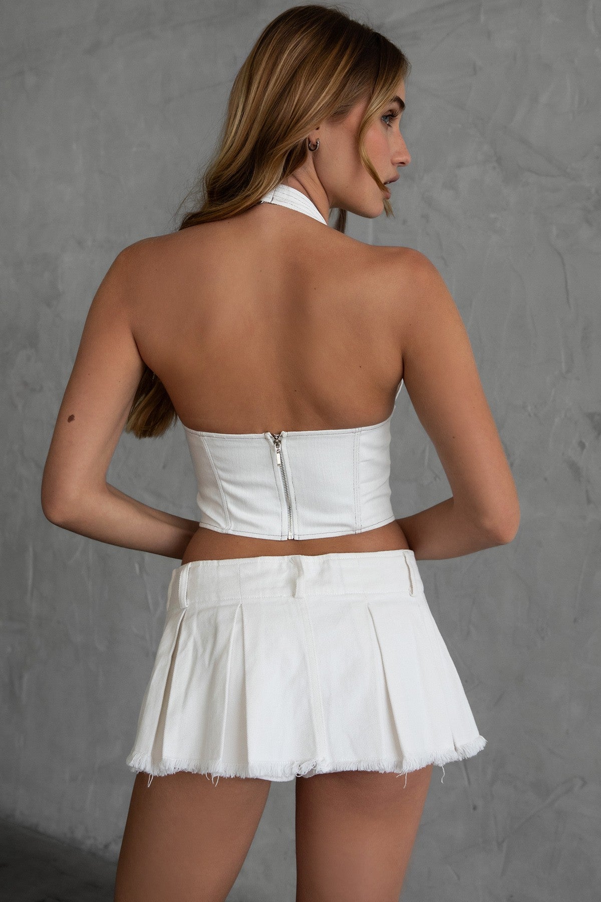 TIC TOC SC30477 ELENA Pleated Low Rise Mini Skirt with Raw Hem and Built-In Shorts