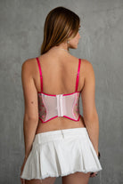TIC TOC TC30849 CERISE Mesh Embroidery Bustier Corset Top in pink. Features embroidered cups, supportive underwire, satin tie detail, and sheer mesh stretch fabric.
