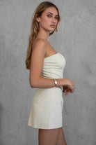 TIC TOC TH30024 JANICE Stretch Linen Corset Top in natural cream features boned panel construction, double-lined fabric, and an exposed back zipper.