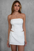 TIC TOC TH30024 JANICE Stretch Linen Corset Top in white features boned panel construction, double-lined fabric, and an exposed back zipper.