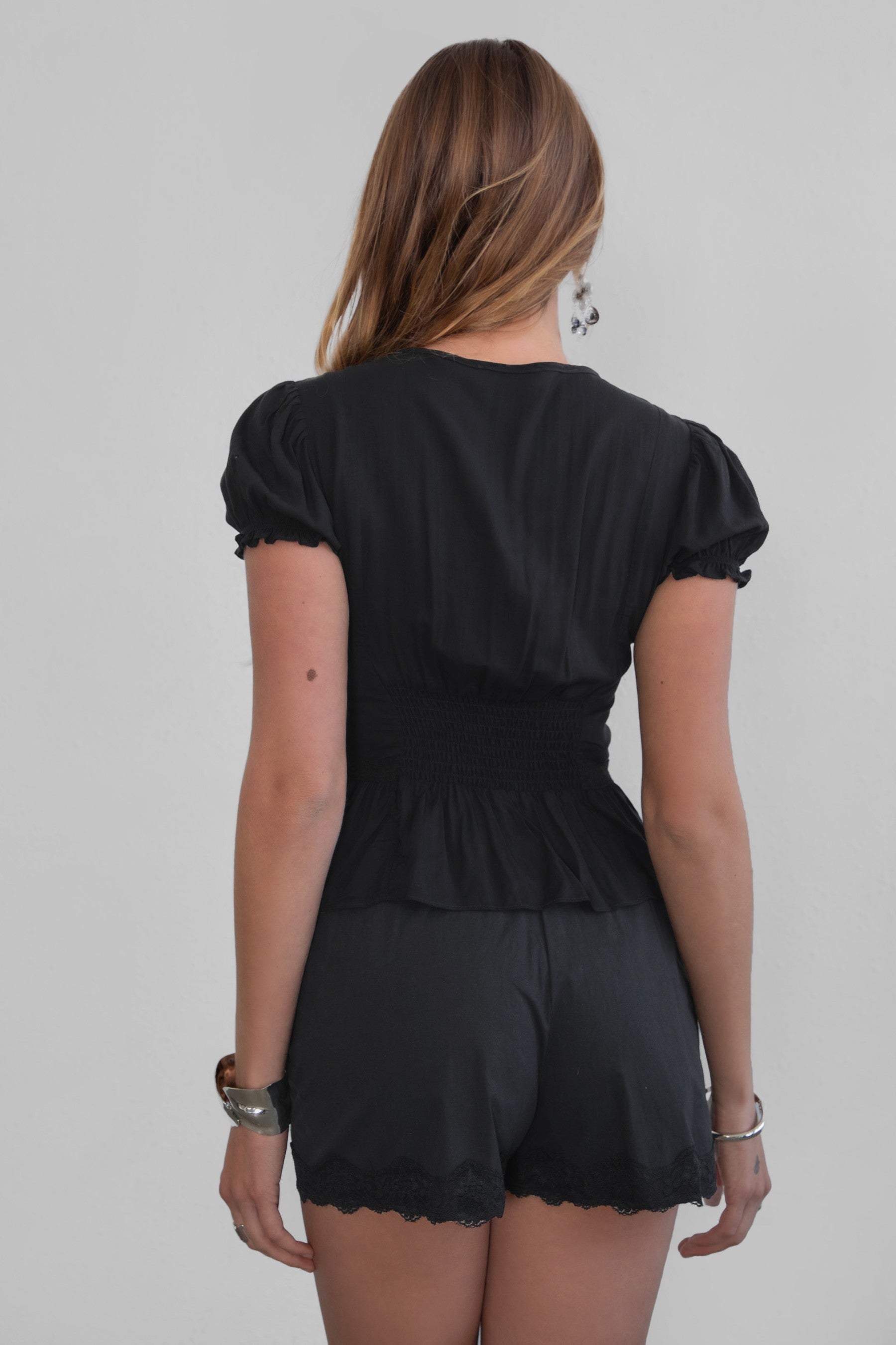 AGATHA Rayon Challis Keyhole Ruffle Blouse serves effortless romance with a soft, vintage feel.