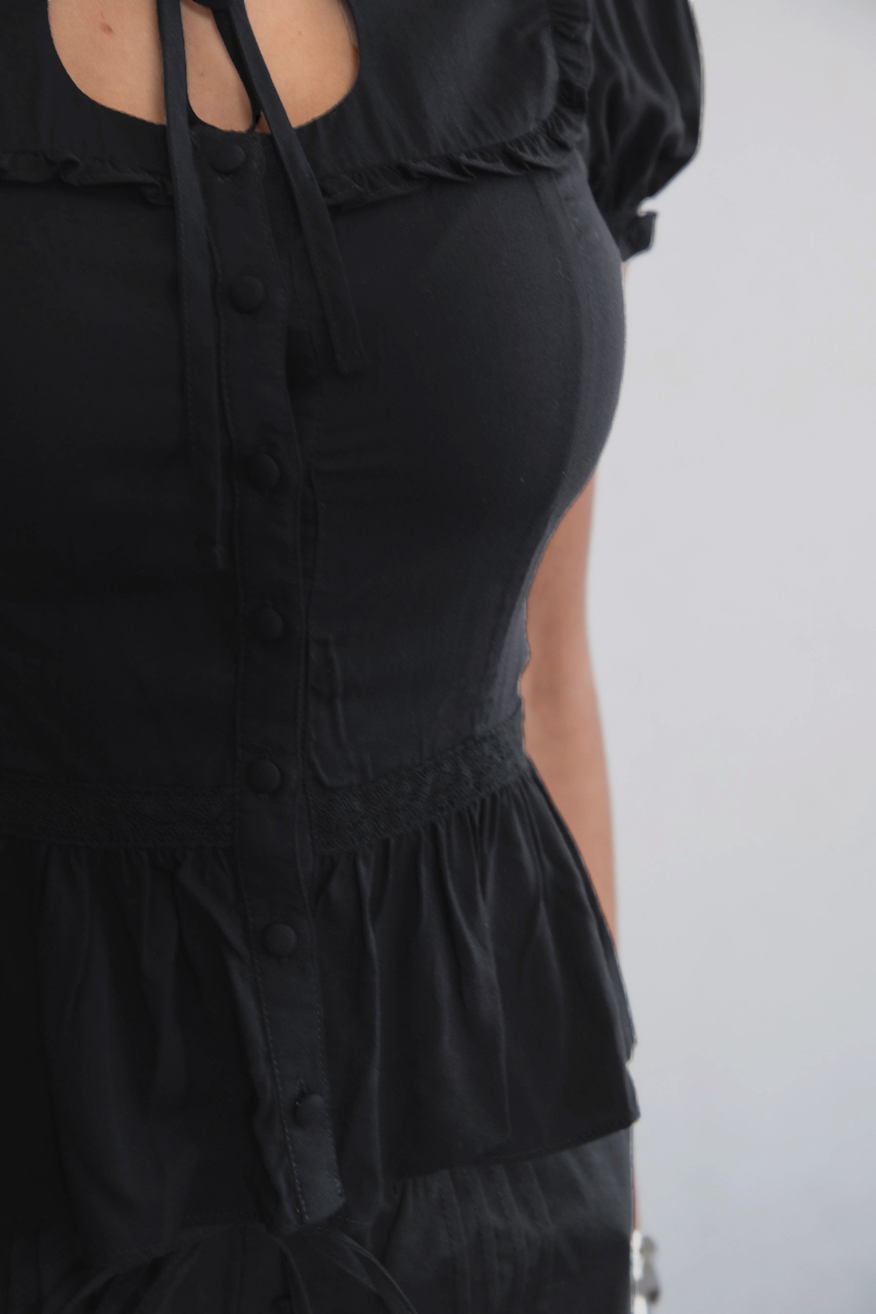 AGATHA Rayon Challis Keyhole Ruffle Blouse serves effortless romance with a soft, vintage feel.