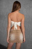 Woman wearing TIC TOC WREN Cream Stretch Lace Scarf Top withe a denim mini skirt