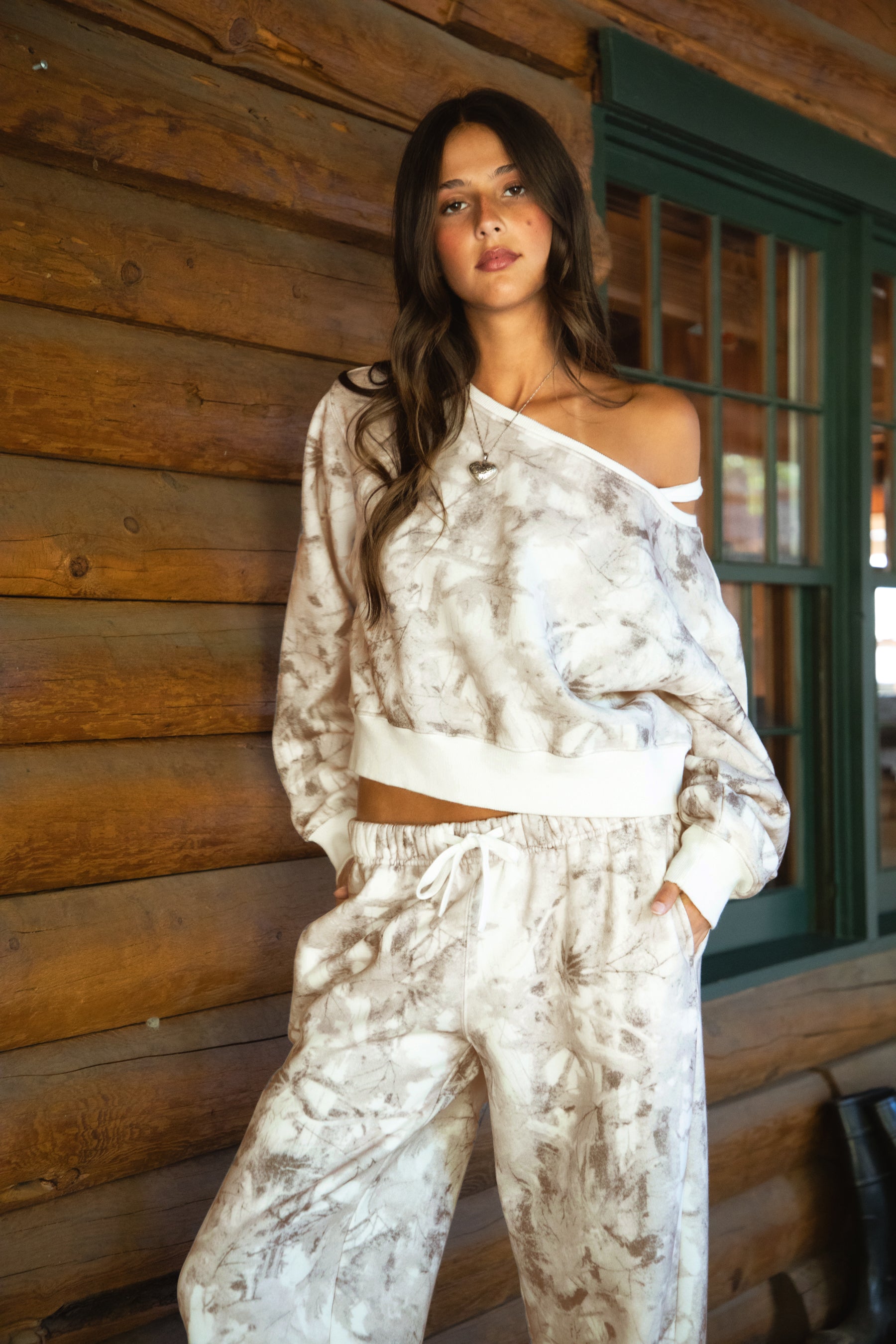 AVERY Light Woodland Camo  Fleece Off The Shoulder Sweatshirt
Relaxed Off The Shoulder Construction 
Rib Knit Hem and Cuffs  
Light Forest Woodland Camo in Dusted Grey
Featured In Our New Cloud Fleece Fabric 
Back To School Western Rodeo Outfit Fashion Inspo
Cloud Fleece Key Features: 
Soft & Lightweight: Gentle on the skin with a breezy feel.
Midweight Warmth: Keeps you comfortable without overheating.
Drapey Design: Flows effortlessly for a flattering, laid-back look
