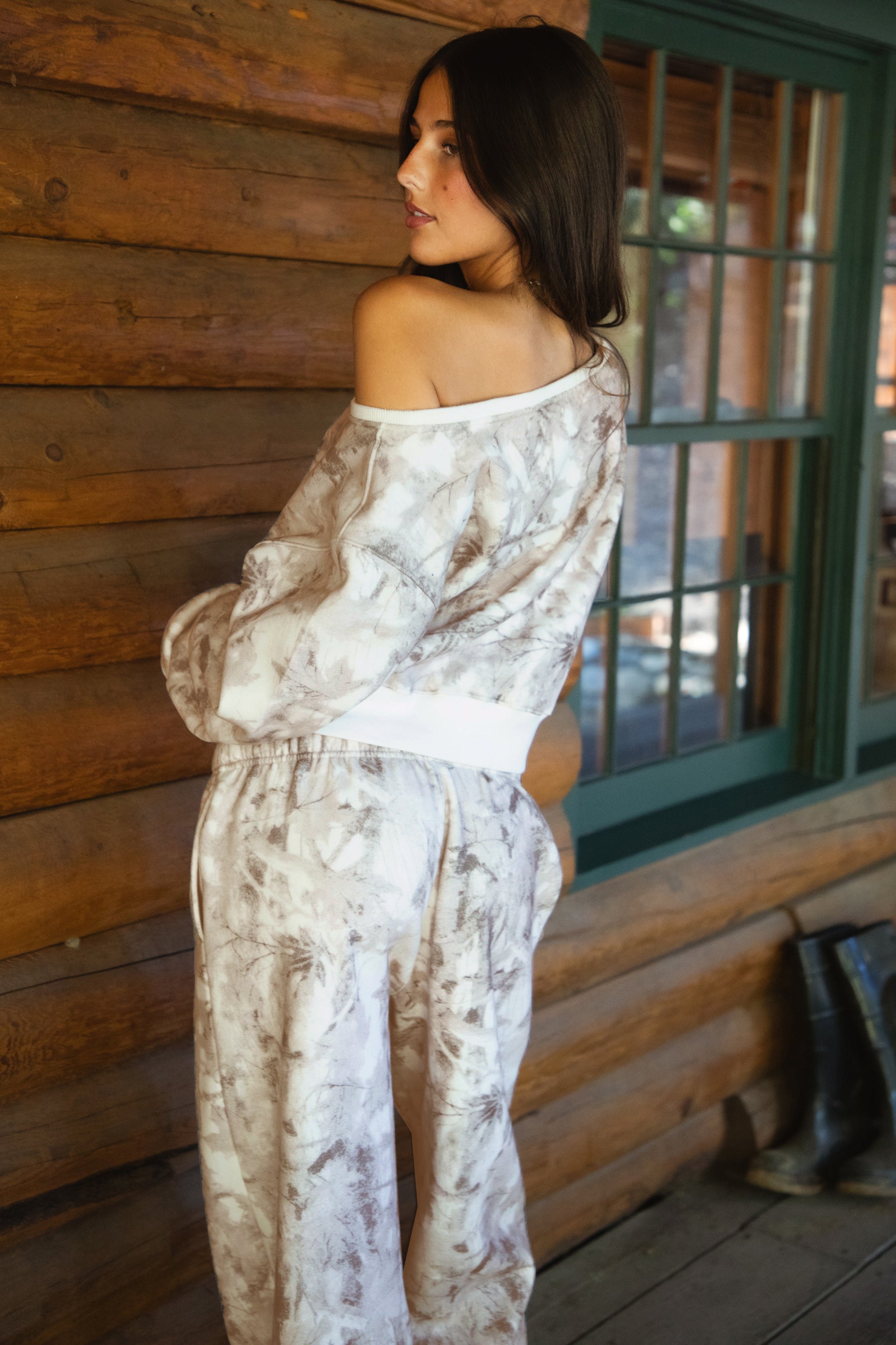 AVERY Light Woodland Camo  Fleece Off The Shoulder Sweatshirt
Relaxed Off The Shoulder Construction 
Rib Knit Hem and Cuffs  
Light Forest Woodland Camo in Dusted Grey
Featured In Our New Cloud Fleece Fabric 
Back To School Western Rodeo Outfit Fashion Inspo
Cloud Fleece Key Features: 
Soft & Lightweight: Gentle on the skin with a breezy feel.
Midweight Warmth: Keeps you comfortable without overheating.
Drapey Design: Flows effortlessly for a flattering, laid-back look