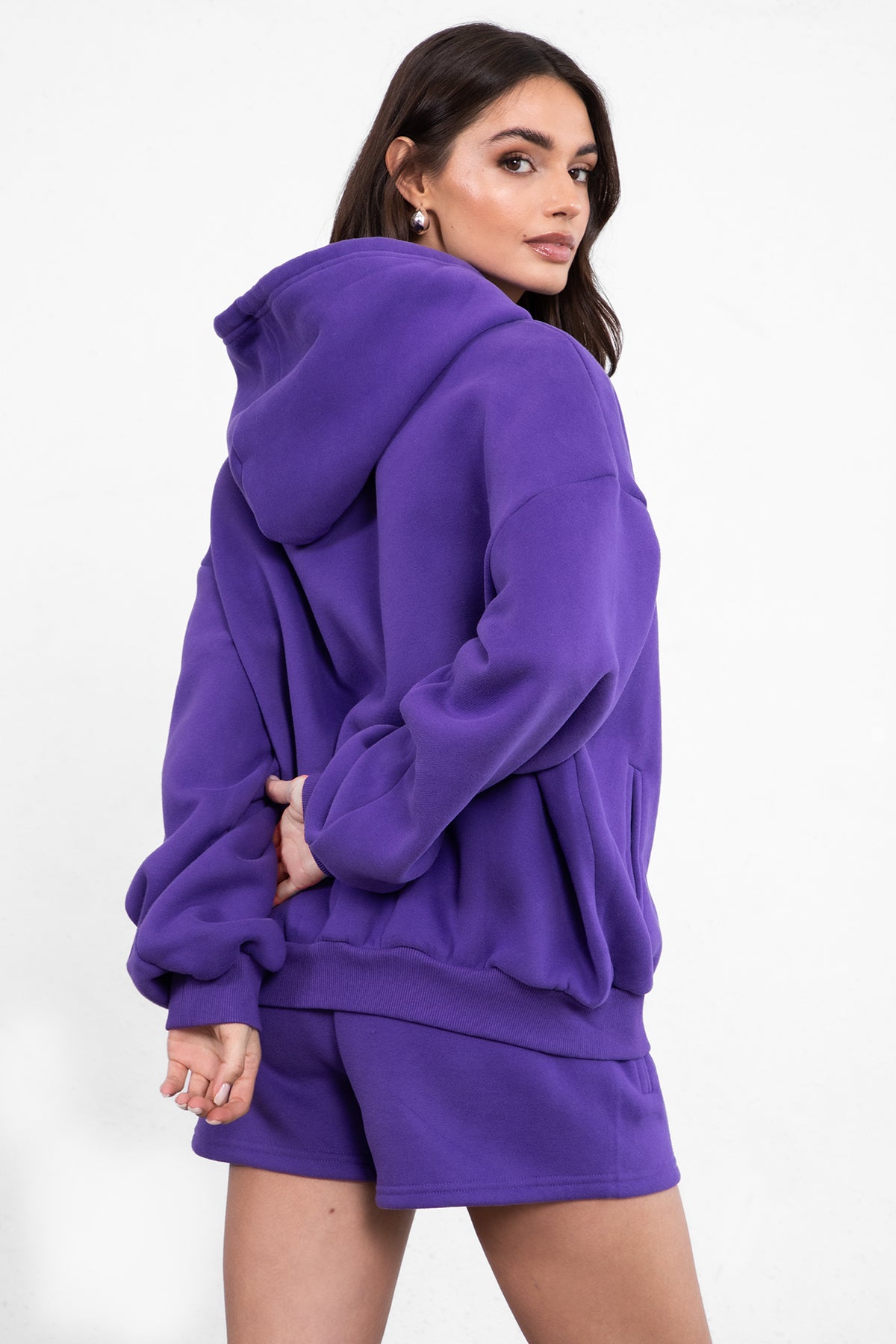 Purple oversized zip-up fleece hoodie with ribbed cuffs and a thick fleece texture for added warmth by Tic Toc.