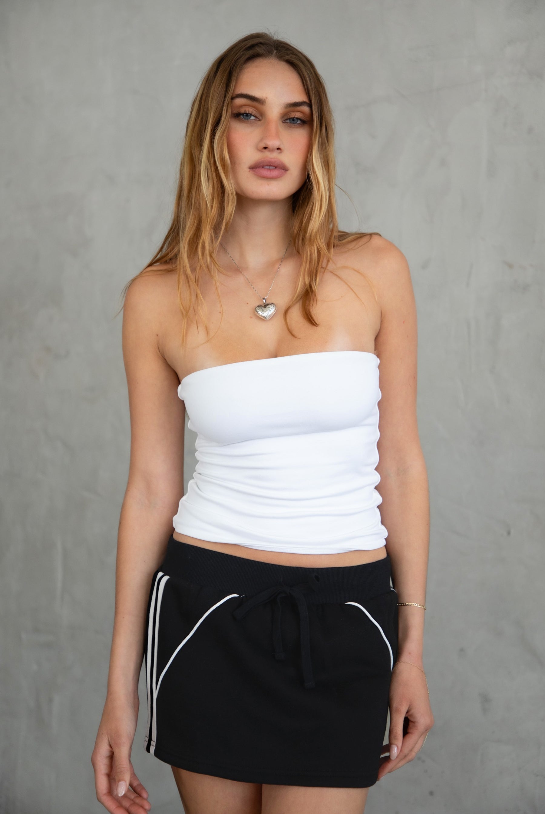 COLBI Essentials Plush Fleece Mini Skort with ribbed tie waistband and contrast piping in black