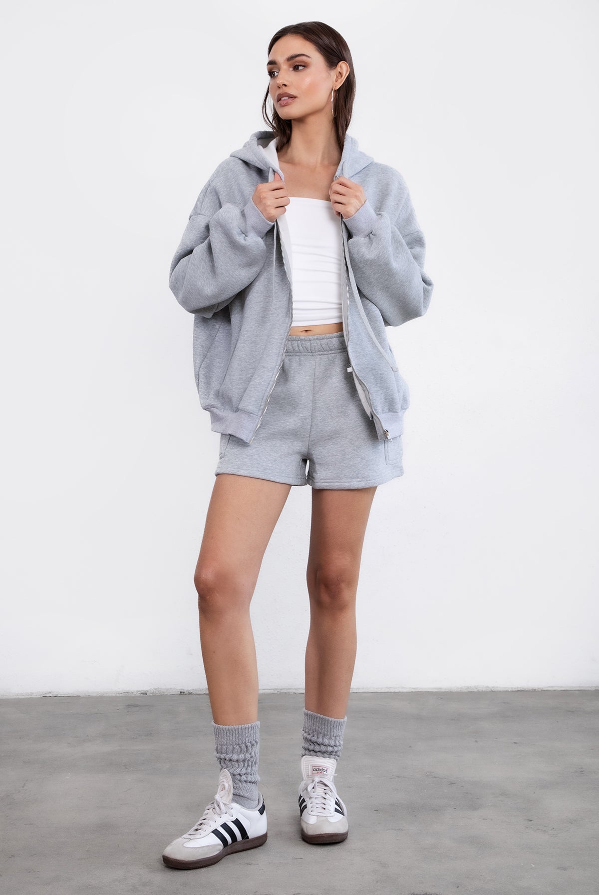 Heather grey oversized zip-up fleece hoodie with ribbed hem and cuffs for a classic casual look by Tic Toc.