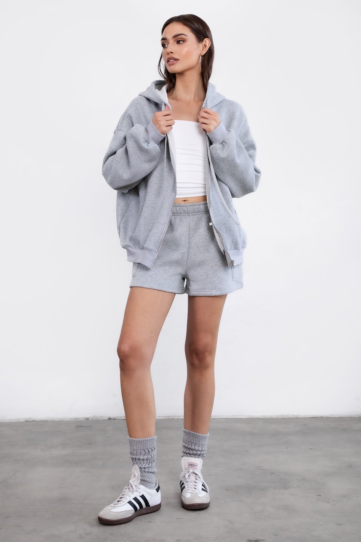 Heather grey oversized zip-up fleece hoodie with ribbed hem and cuffs for a classic casual look by Tic Toc.