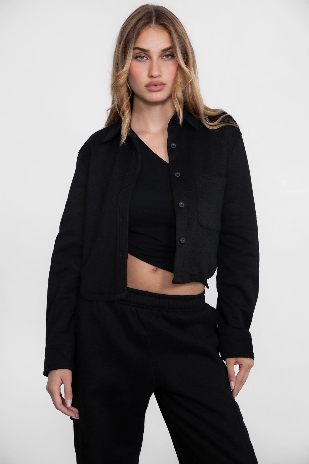 TIC TOC JENNIE cropped fleece shacket in black with button-up front and front pocket detail