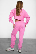 TIC TOC DOVE high waist fleece sweatpants in bright pink with elasticated waistband and side pockets
