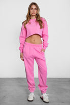 TIC TOC DOVE high waist fleece sweatpants in bright pink with elasticated waistband and side pockets
