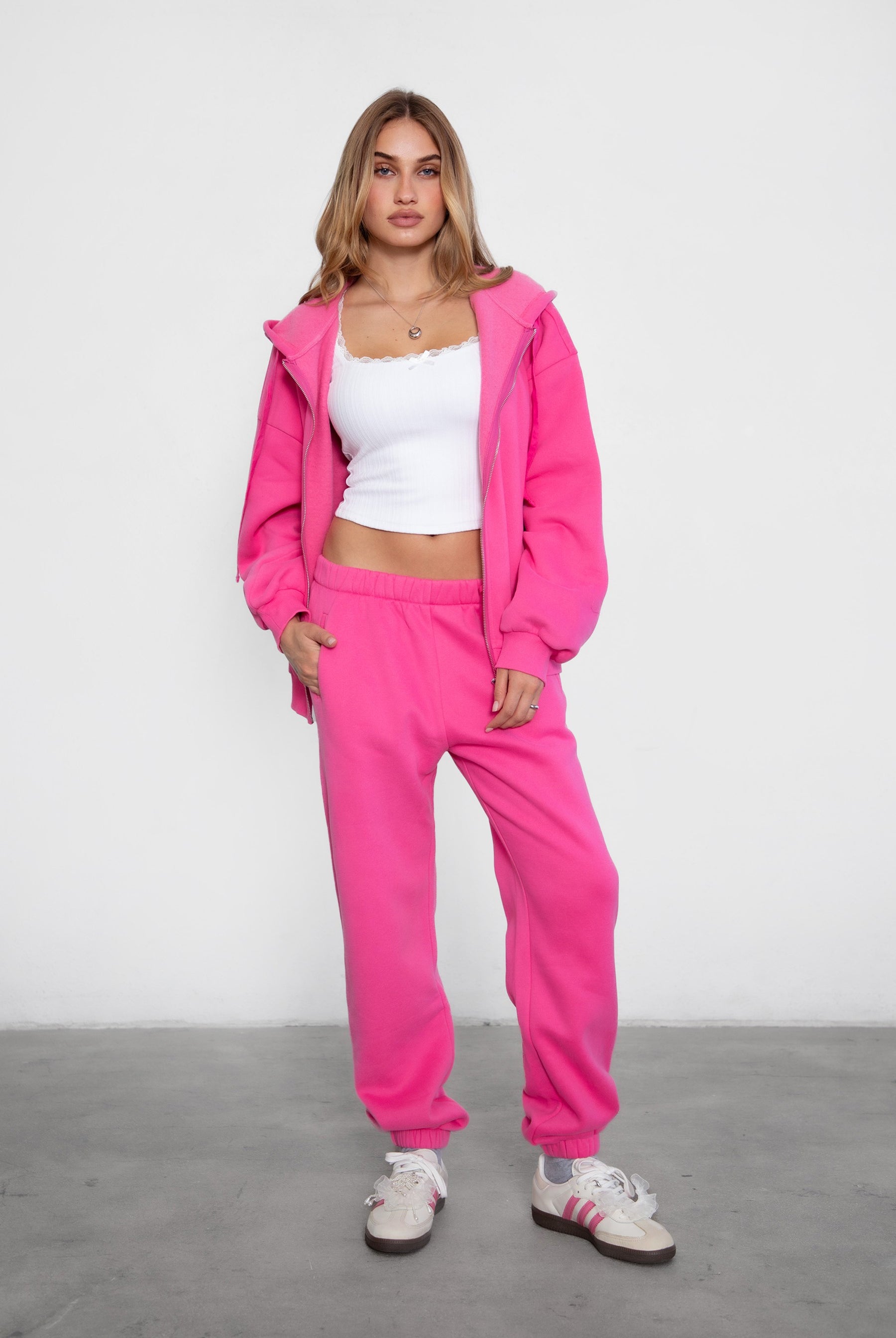 Game-day ready high-waist sweatpants in blush from the Essentials Plush Fleece Collection in fuchsia