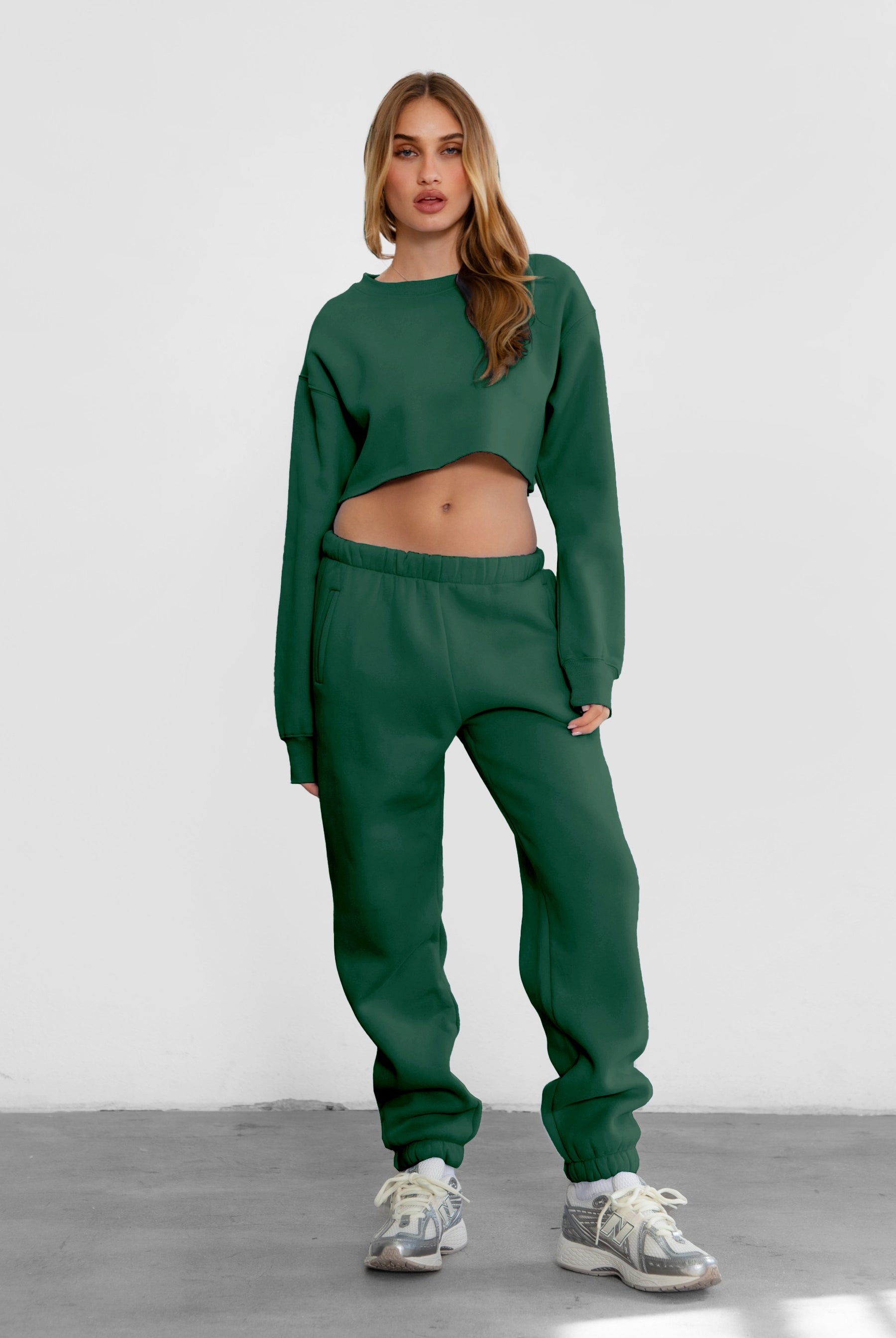 Game-day ready high-waist sweatpants in blush from the Essentials Plush Fleece Collection in hunter green