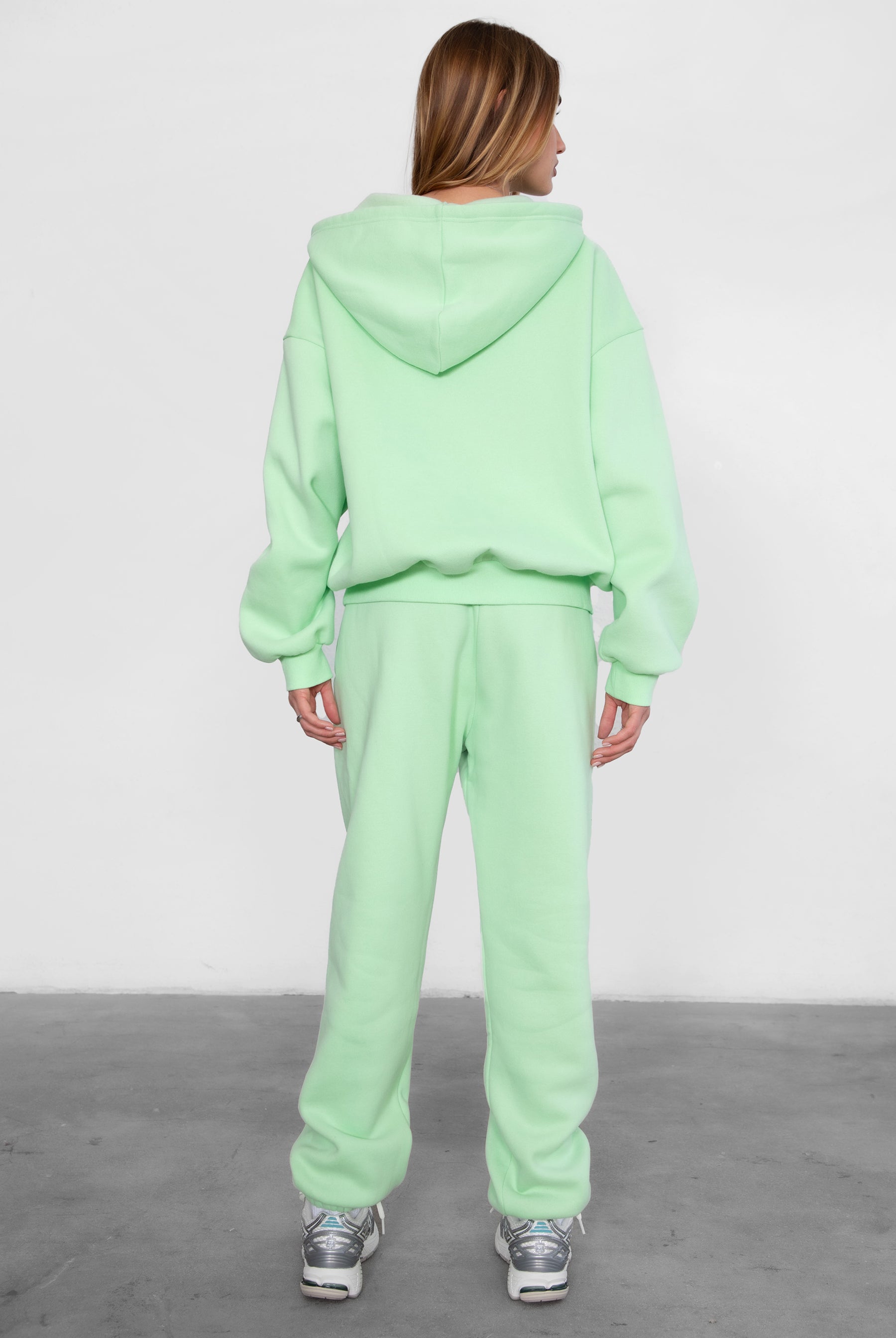 Game-day ready high-waist sweatpants in blush from the Essentials Plush Fleece Collection in pastel lime