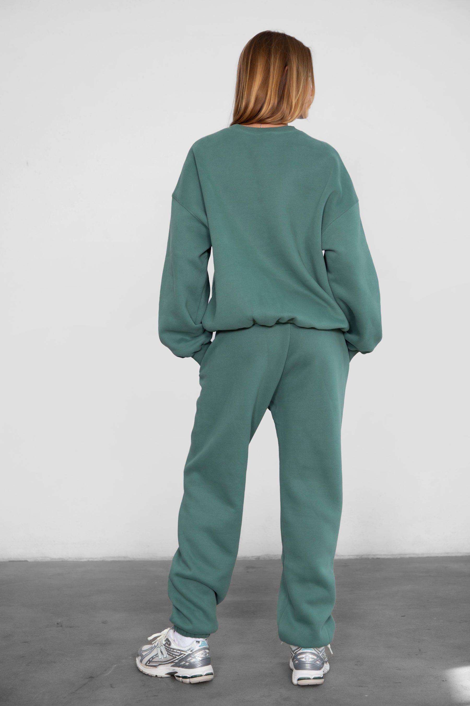 Game-day ready high-waist sweatpants in blush from the Essentials Plush Fleece Collection in pine green