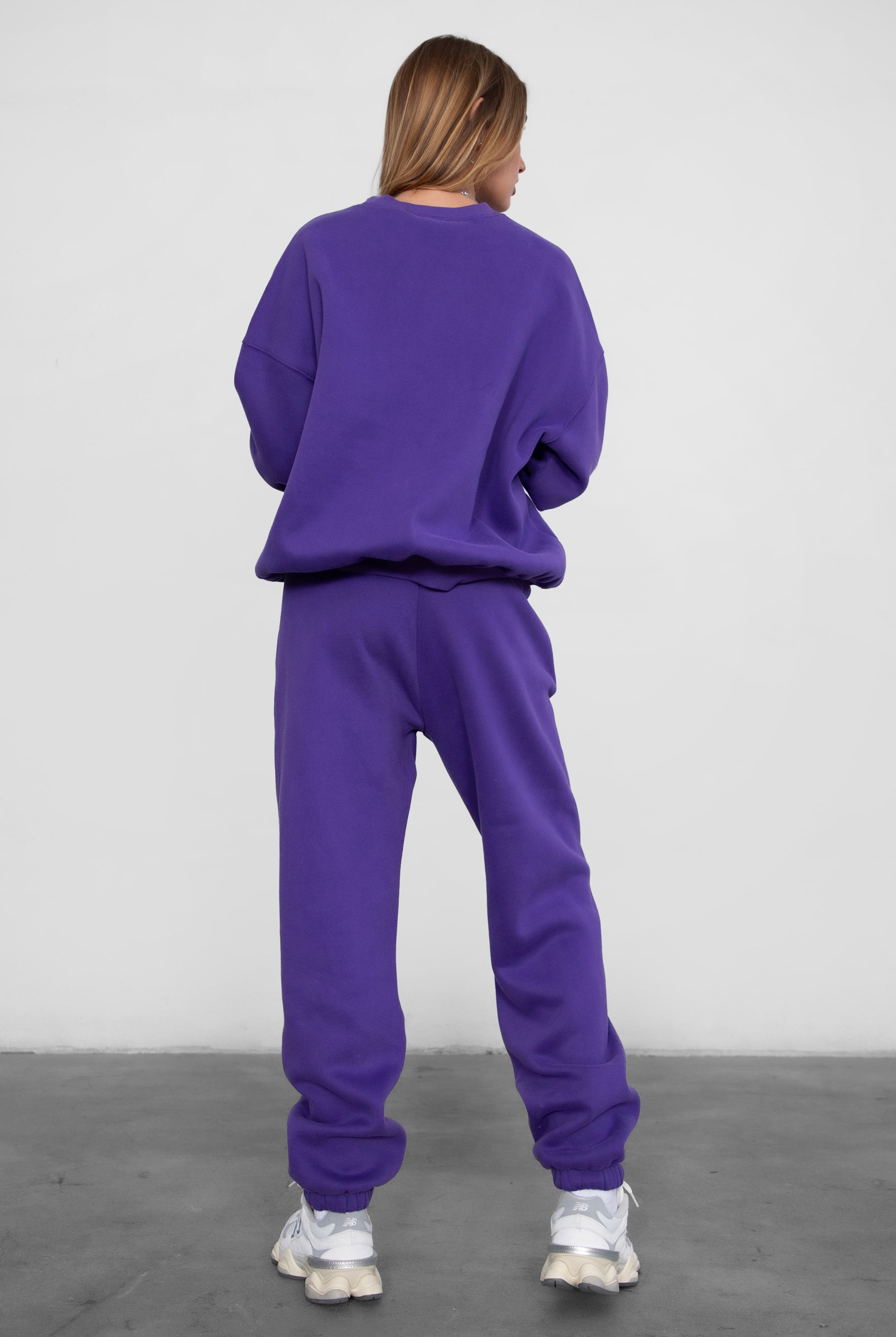 Game-day ready high-waist sweatpants in blush from the Essentials Plush Fleece Collection in purple