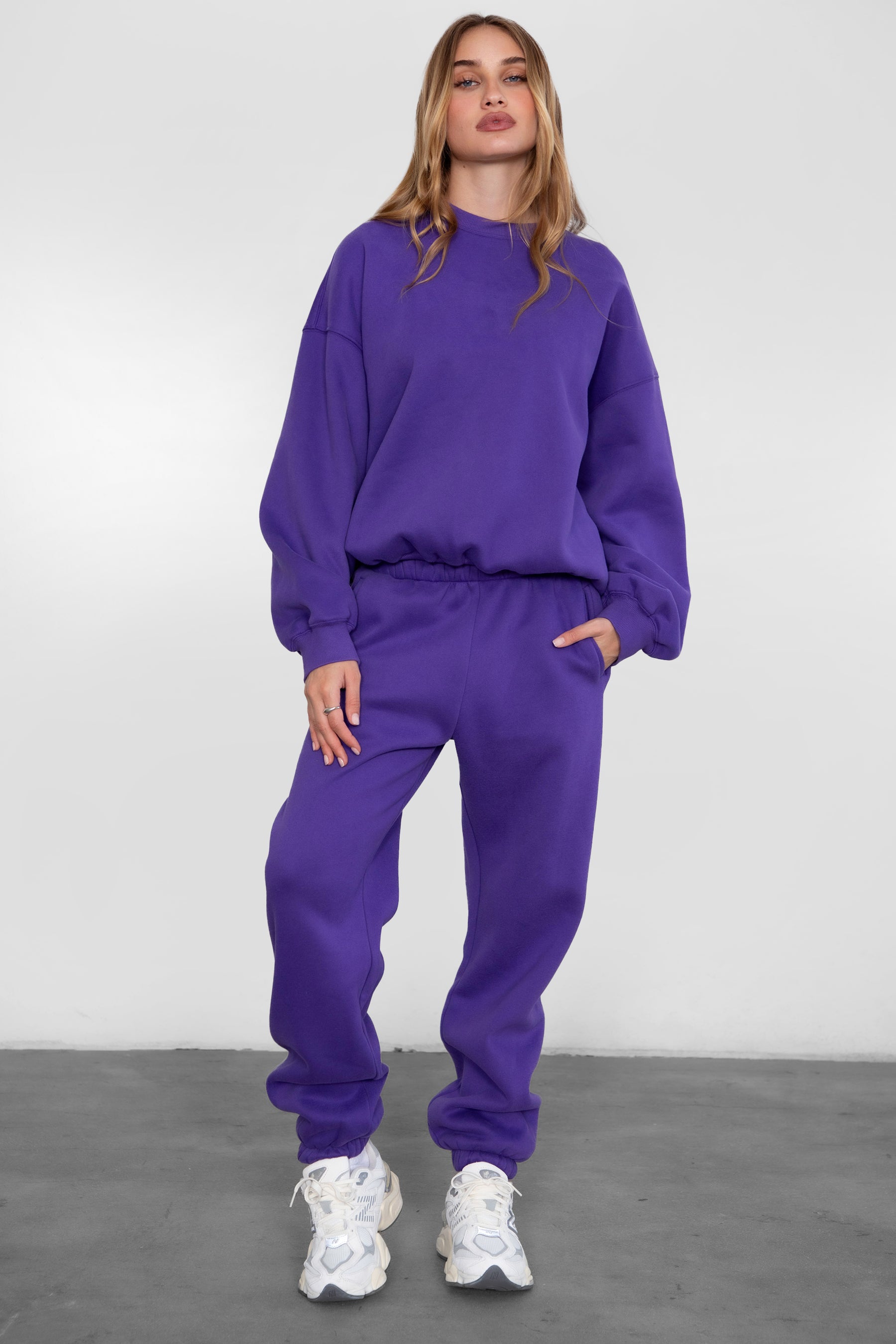 Game-day ready high-waist sweatpants in blush from the Essentials Plush Fleece Collection in purple