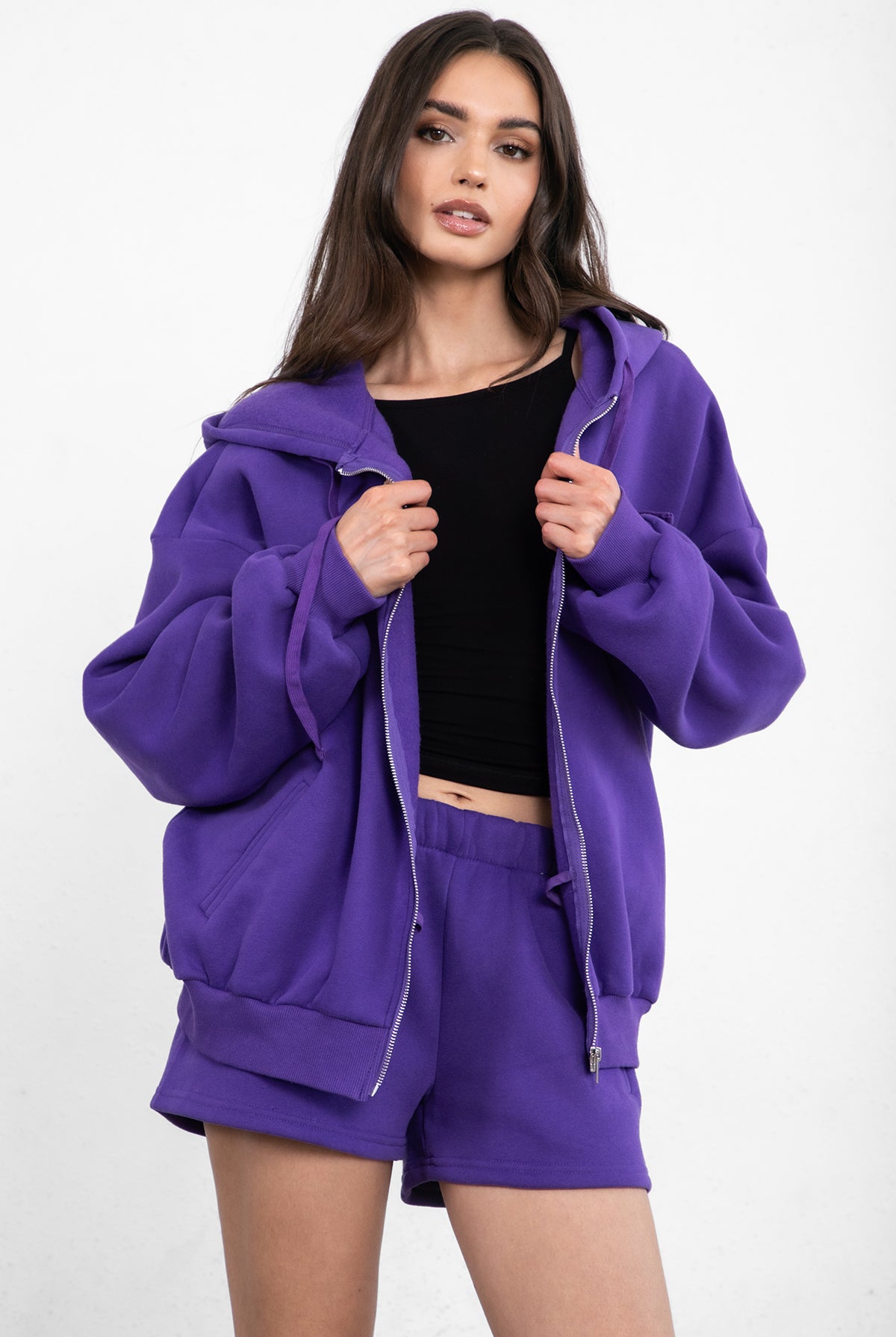 Purple oversized zip-up fleece hoodie with ribbed cuffs and a thick fleece texture for added warmth by Tic Toc.