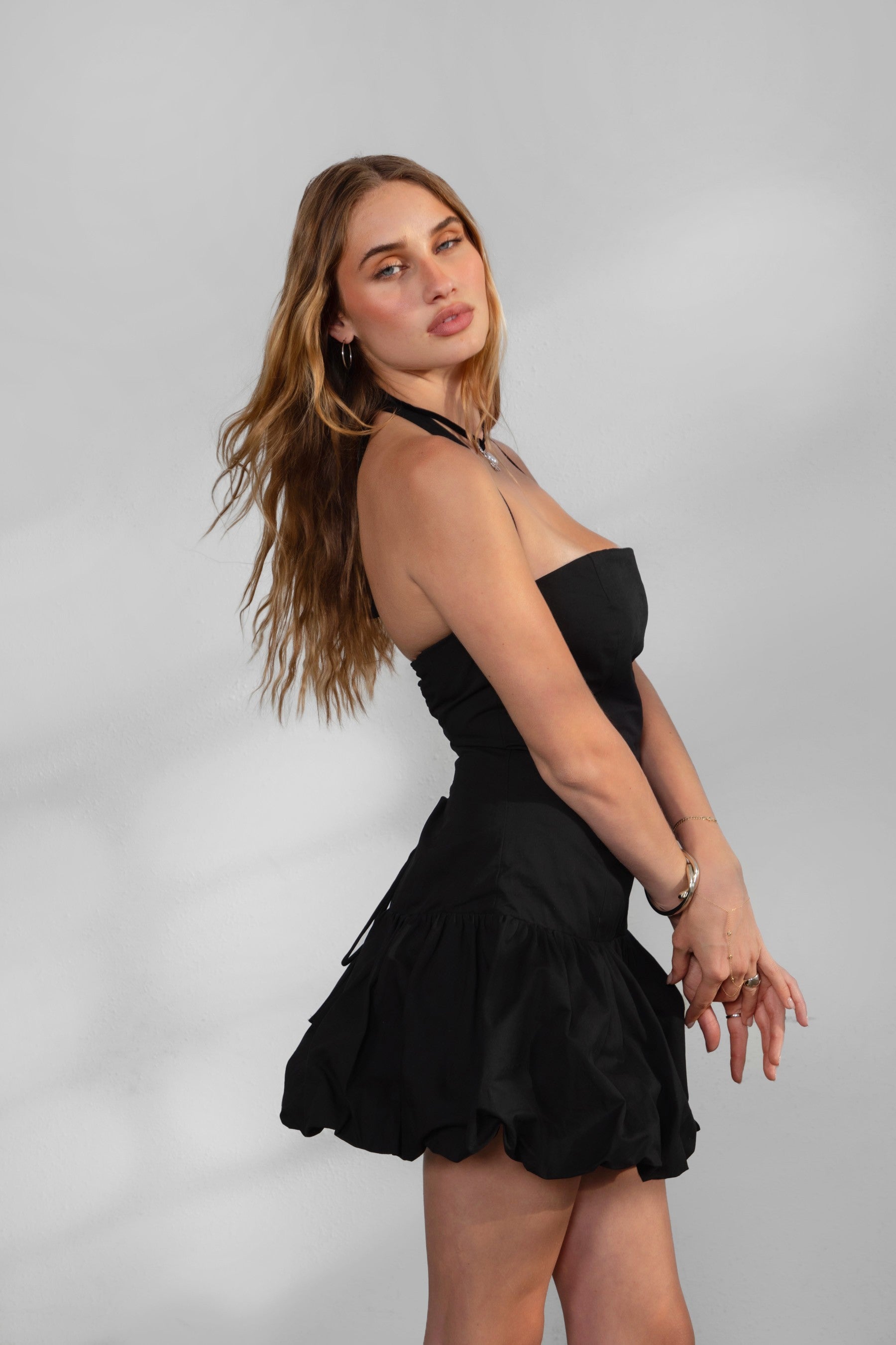 TIC TOC DH30936 DOLY Mini Dress featuring halter neckline, lace-up open back, and bubble hem in stretch twill fabric.