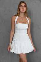 TIC TOC DH30936 DOLY Mini Dress featuring halter neckline, lace-up open back, and bubble hem in stretch twill fabric.
