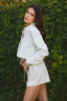 PA31288-ROWAN Linen Low Rise Drawstring Shorts are an easy essential for sun-soaked days. Designed with a relaxed fit and adjustable drawstring waist, these lightweight shorts are crafted from a breathable linen blend in a slightly unique shade from the rest of the collection. Perfect for lounging, summer getaways, or as a chic beach cover-up. Pair it with the matching top (sold separately, style TH29605) for a full boho-inspired look.