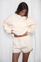 SHORTY  Solid Drawstring Waist Fleece Track Mini Short
 Mid Rise Waistband
Adjustable Waist Drawstring Tie
Retro Sporty Dolphin Curved Hemline
Straight Leg Fit Inseam 2.75 inches
SHORTY  Solid Drawstring Waist Fleece Track Mini Shorts
 Mid-Rise Waistband
Adjustable Waist Drawstring Tie
Retro Sporty Dolphin Curved Hemline
Inseam 2.75 inches
Matching Shades to the Essentials Plush Fleece Collection

Plush Fleece Key Features:
Plush & Fluffy Texture: Ultra-soft and incredibly cozy.
Heavyweight Warmth: Provides