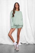 SHORTY  Solid Drawstring Waist Fleece Track Mini Short
 Mid Rise Waistband
Adjustable Waist Drawstring Tie
Retro Sporty Dolphin Curved Hemline
Straight Leg Fit Inseam 2.75 inches
SHORTY  Solid Drawstring Waist Fleece Track Mini Shorts
 Mid-Rise Waistband
Adjustable Waist Drawstring Tie
Retro Sporty Dolphin Curved Hemline
Inseam 2.75 inches
Matching Shades to the Essentials Plush Fleece Collection

Plush Fleece Key Features:
Plush & Fluffy Texture: Ultra-soft and incredibly cozy.
Heavyweight Warmth: Provides