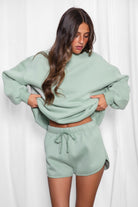 SHORTY  Solid Drawstring Waist Fleece Track Mini Short
 Mid Rise Waistband
Adjustable Waist Drawstring Tie
Retro Sporty Dolphin Curved Hemline
Straight Leg Fit Inseam 2.75 inches
SHORTY  Solid Drawstring Waist Fleece Track Mini Shorts
 Mid-Rise Waistband
Adjustable Waist Drawstring Tie
Retro Sporty Dolphin Curved Hemline
Inseam 2.75 inches
Matching Shades to the Essentials Plush Fleece Collection

Plush Fleece Key Features:
Plush & Fluffy Texture: Ultra-soft and incredibly cozy.
Heavyweight Warmth: Provides