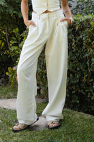 PH29607-CAMBRIDGE Mid Rise Linen Wide Leg Pants&nbsp; offer effortless elegance with a relaxed, tailored edge. Designed with a mid-rise fit, front clasp and zipper closure, belt loops, and both front and back pockets, these pants feature subtle pleats and a floor-grazing wide leg for a flattering, flowy silhouette. Crafted from a breathable, lightweight linen blend—perfect for lounging, travel, or a breezy boho-inspired look.

Pairs perfectly with matching tops (sold separately: TH29605, TH29609).