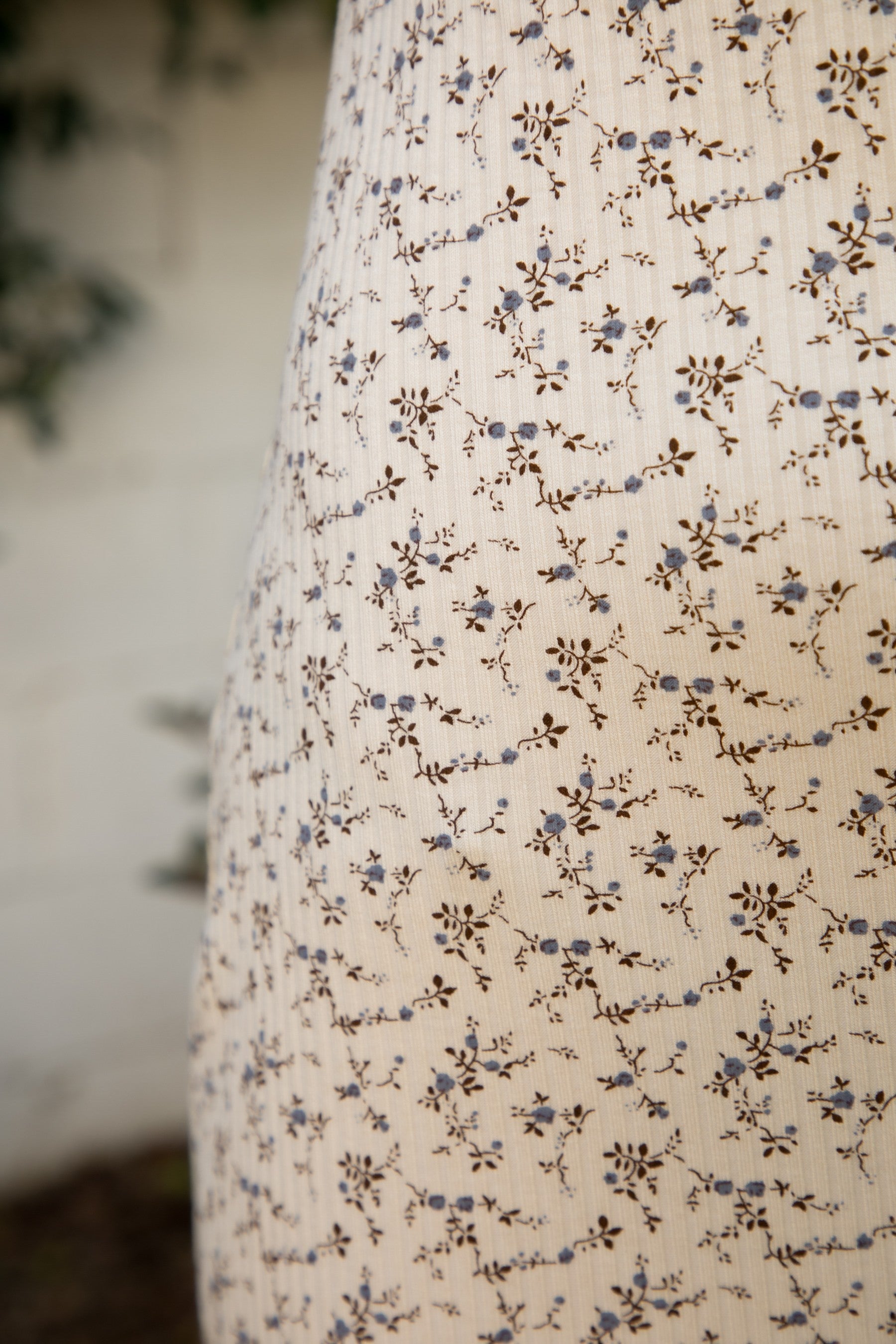 Woman wearing TIC TOC PH31982-LYNN-P LYNN high waist floral print pointelle pants featuring a high waisted elastic waistband with exposed lace trim, ribbed floral pointelle fabric, relaxed straight leg silhouette, and soft airy stretch jersey feel, styled with a fitted basic top for a feminine lounge and everyday look.