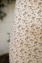 Woman wearing TIC TOC PH31982-LYNN-P LYNN high waist floral print pointelle pants featuring a high waisted elastic waistband with exposed lace trim, ribbed floral pointelle fabric, relaxed straight leg silhouette, and soft airy stretch jersey feel, styled with a fitted basic top for a feminine lounge and everyday look.