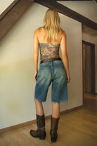 TERRI Denim Baggy Dad Skater Jorts 
Low Rise Design With Belt Loop Details 
Zipper Fly Button Closure 
Five Pocket Design 
Distressed Faded Vintage Denim Wash 
Relaxed Below The Knee Fit 
Back To School Western Rodeo Outfit Fashion Inspo