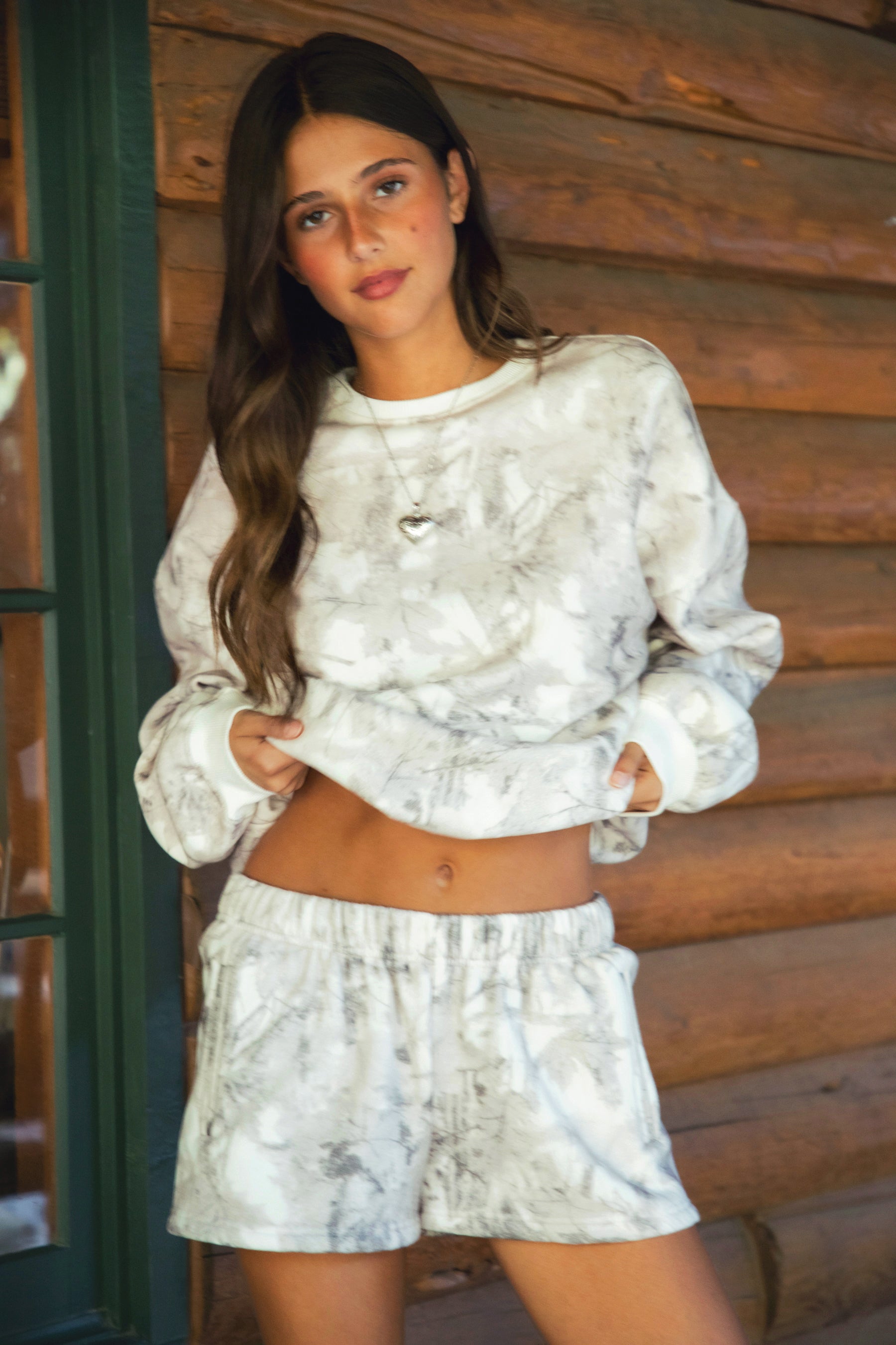 AVERY Light Woodland Camo Mid Rise Fleece Shorts 
Relaxed Straight Leg Lounge Fit
Elasticated Waistband 
Deep Reversible Side Pockets 
Light Forest Woodland Camo in Dusted Grey
Featured In Our New Cloud Fleece Fabric 
Back To School Western Rodeo Outfit Fashion Inspo

Cloud Fleece Key Features: 
Soft & Lightweight: Gentle on the skin with a breezy feel.
Midweight Warmth: Keeps you comfortable without overheating.
Drapey Design: Flows effortlessly for a flattering, laid-back look
