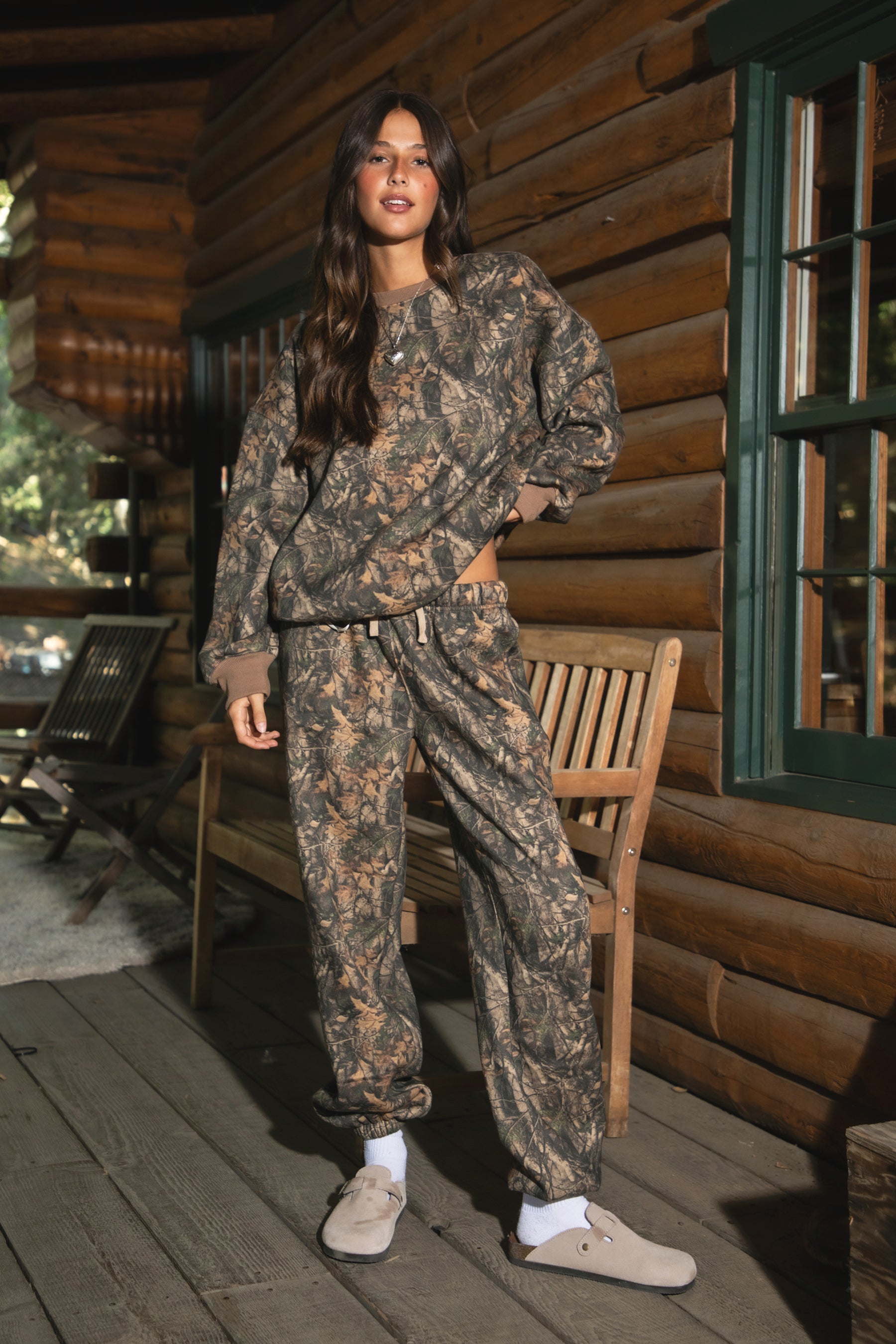 BAYOU Dark Woodland Camo Fleece Lounge Sweatpants
Elasticated Self-Tie Waistband 
Deep Reversible Side Pockets 
Slightly Tapered Ankle Length And  Elastic Cinch Bottom
Dark Forest Woodland Camo
Featured In Our New Cloud Fleece Fabric 
Back To School Western Rodeo Outfit Fashion Inspo

Cloud Fleece Key Features: 
Soft & Lightweight: Gentle on the skin with a breezy feel.
Midweight Warmth: Keeps you comfortable without overheating.
Drapey Design: Flows effortlessly for a flattering, laid-back look
