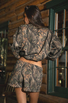 BAYOU Dark Woodland Camo Mid Rise Fleece Shorts 
Relaxed Straight Leg Lounge Fit
Elasticated Waistband 
Deep Reversible Side Pockets 
Dark Forest Woodland Camo
Featured In Our New Cloud Fleece Fabric 
Back To School Western Rodeo Outfit Fashion Inspo

Cloud Fleece Key Features: 
Soft & Lightweight: Gentle on the skin with a breezy feel.
Midweight Warmth: Keeps you comfortable without overheating.
Drapey Design: Flows effortlessly for a flattering, laid-back look
