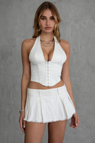 TIC TOC SC30477 ELENA Pleated Low Rise Mini Skirt with Raw Hem and Built-In Shorts