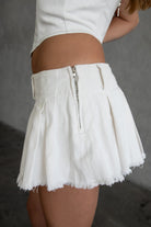 TIC TOC SC30477 ELENA Pleated Low Rise Mini Skirt with Raw Hem and Built-In Shorts