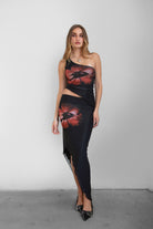 TIC TOC SC30926 MUAH S Mesh Print Asymmetrical Skirt featuring abstract floral mesh design with mid-rise waist and angled hem.