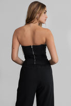 TIC TOC TA30224 KARMEN Strapless Corset Top with sheer center cutout and rhinestone bow embellishments.