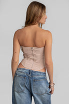 TIC TOC TA30224 KARMEN Strapless Corset Top with sheer center cutout and rhinestone bow embellishments.