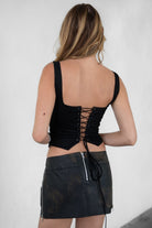 TIC TOC JESSIE Embroidered Suede Corset in Black with square neckline, faux button front, and lace-up back.