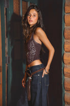 Side view showing lace-up back and halter neckline of MARGEE in Dark Brown