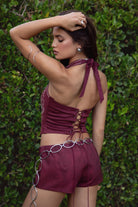 Back view of Dark Red MARGEE halter showing open lace-up